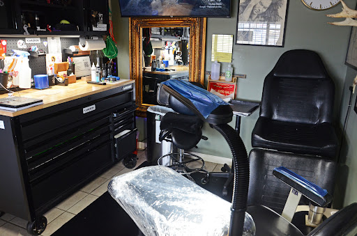 Explore santa tattoo ideas, creative tattoo ideas in Gadsden, available at Zekez Inkz Tattoos & Piercings