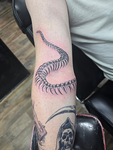 Explore gundam tattoo ideas, creative tattoo ideas in Shallotte, available at Ocean Isle Ink & Piercing
