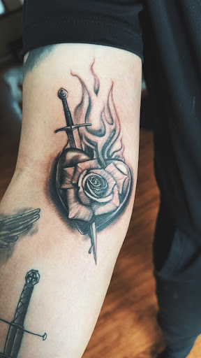 Explore name tattoos on arm ideas, creative tattoo ideas in Manchester, available at Neon Lady Tattoo Studio and Art Gallery