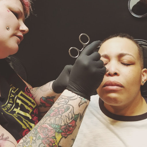 Explore hook tattoo ideas, creative tattoo ideas in Atlanta, available at Empyrean Tattoo Studio