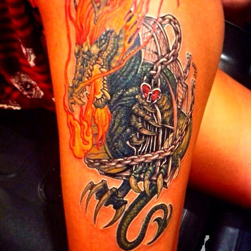 Find in between breast tattoo ideas for your next unique tattoo in Foley at Next Level Tattoo