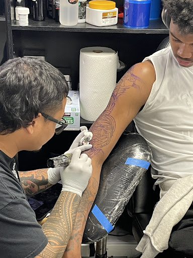 Explore lotus tattoo ideas, creative tattoo ideas in Las Vegas, available at Pogi Tattoo Shop