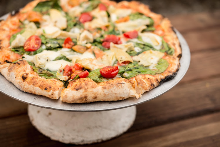 #4 best pizza place in Seaside - Tricycle Pizza | Order Online + In Person + By Phone