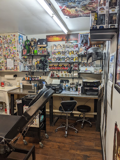 Explore upper leg tattoo ideas, creative tattoo ideas in Alamosa, available at The Shop Tattoo & Comics