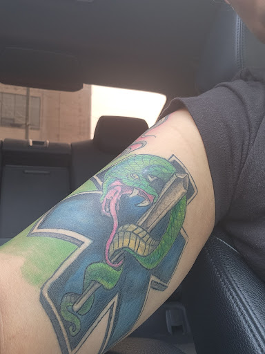 Explore alpha tattoo ideas, creative tattoo ideas in Cincinnati, available at Blue Magic Tattoo Lounge