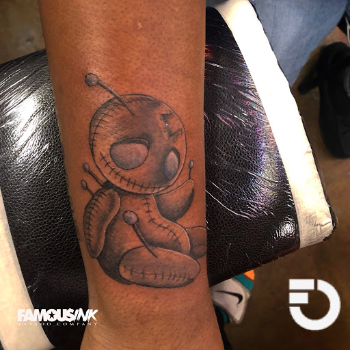 Explore female spine tattoo ideas, creative tattoo ideas in Hammond, available at Famous Ink, Inc.