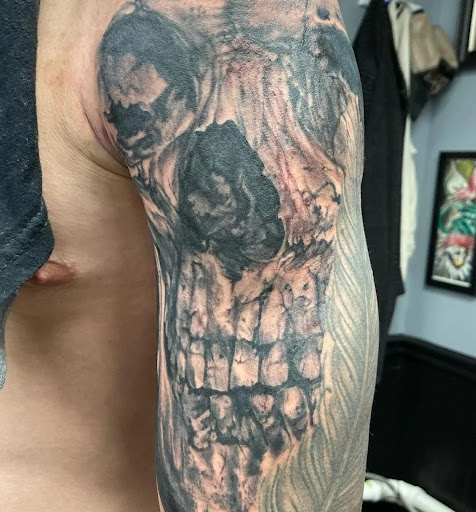 Explore upper back tattoo cover up ideas, creative tattoo ideas in Monroe Township, available at Ink Therapy Tattoo