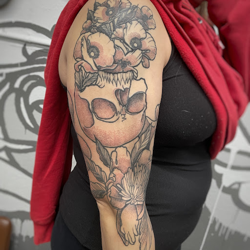 Explore cover up tattoo ideas for names on wrist, creative tattoo ideas in Zumbrota, available at Art by Sinclair Tattoo Artist At Dry Bones Ink