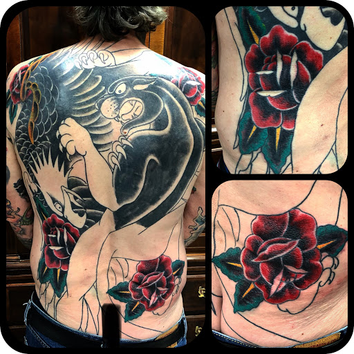 Explore cover up tattoo ideas on thigh, creative tattoo ideas in Black River Falls, available at Black River Tattoo