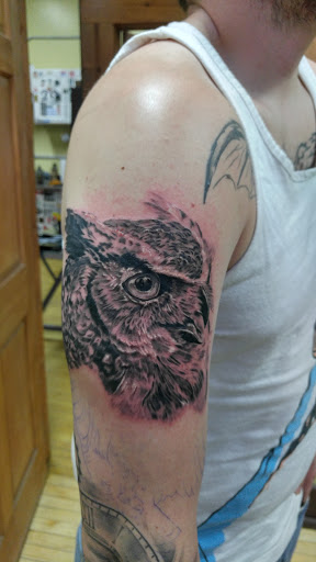 Tattoo Shop «Mos Eisleys», reviews and photos, 71 Division Ave S, Grand Rapids, MI 49503, USA