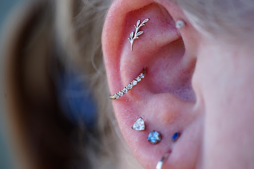 Explore tattoo ideas on spine, creative tattoo ideas in Tacoma, available at Tacomas Best Piercing