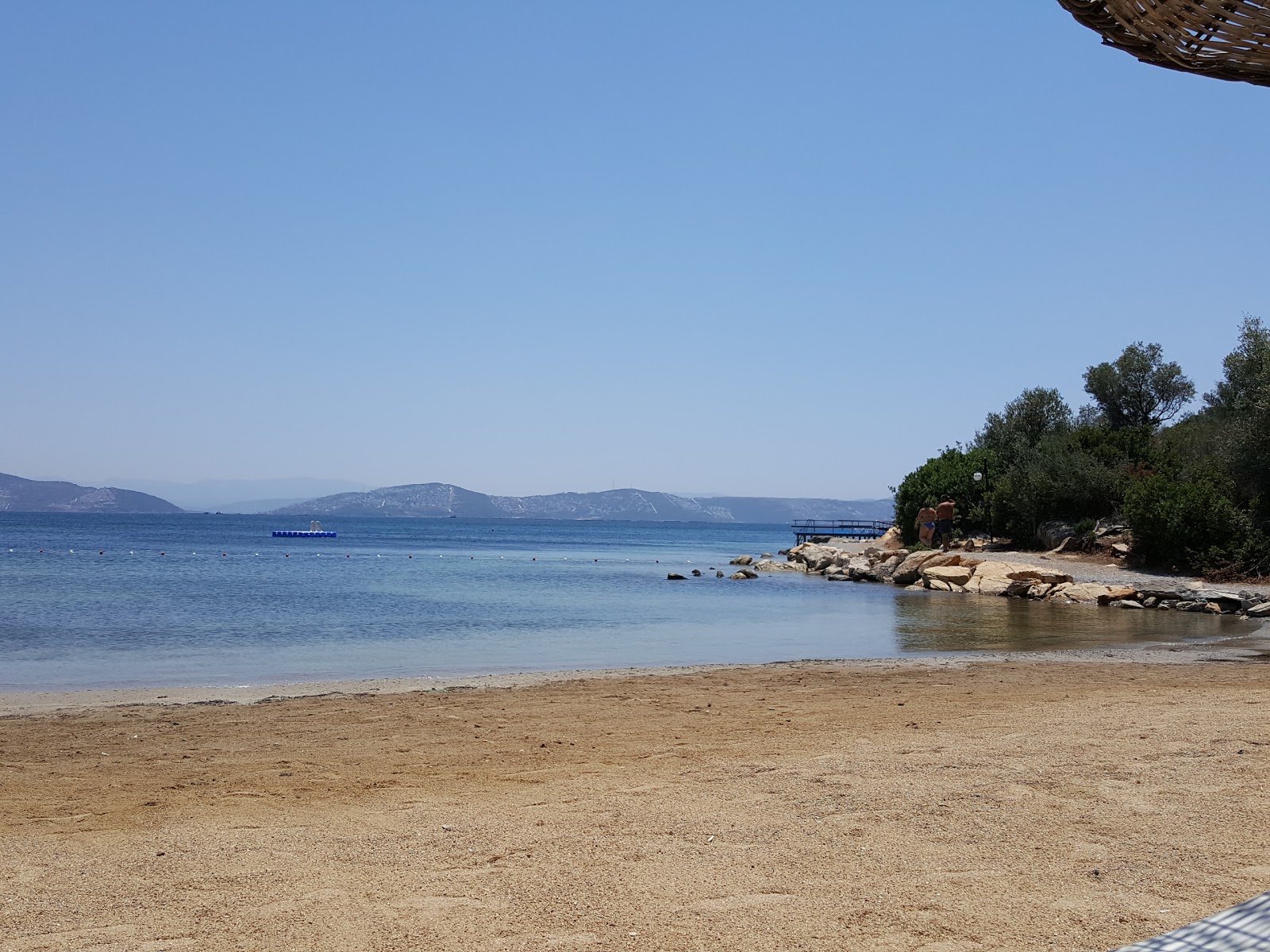 Foto di Tepekoy Cd. beach con una superficie del sabbia beige e ciottoli