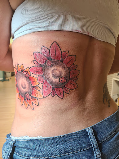 Find archangel tattoo ideas for your next unique tattoo in North Palm Beach at Triton Tattoo North Palm Beach