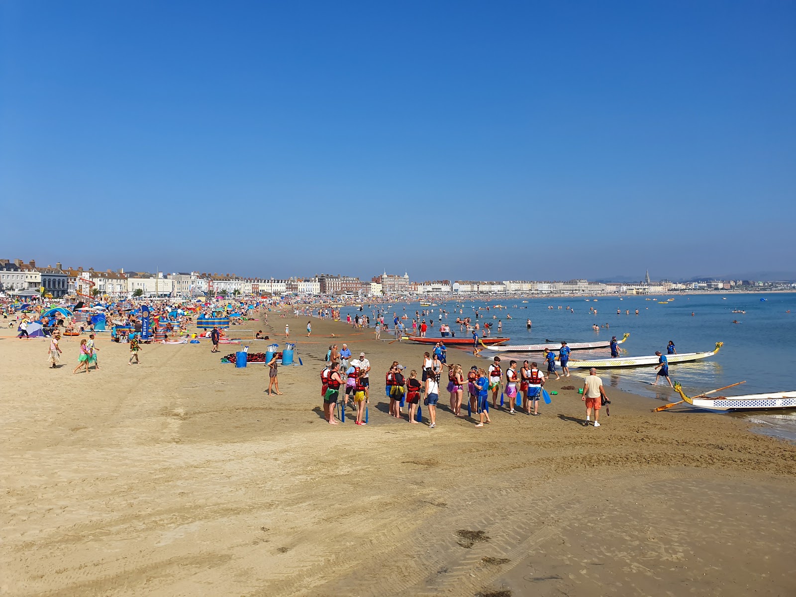 Fotografie cu Plaja Weymouth - locul popular printre cunoscătorii de relaxare