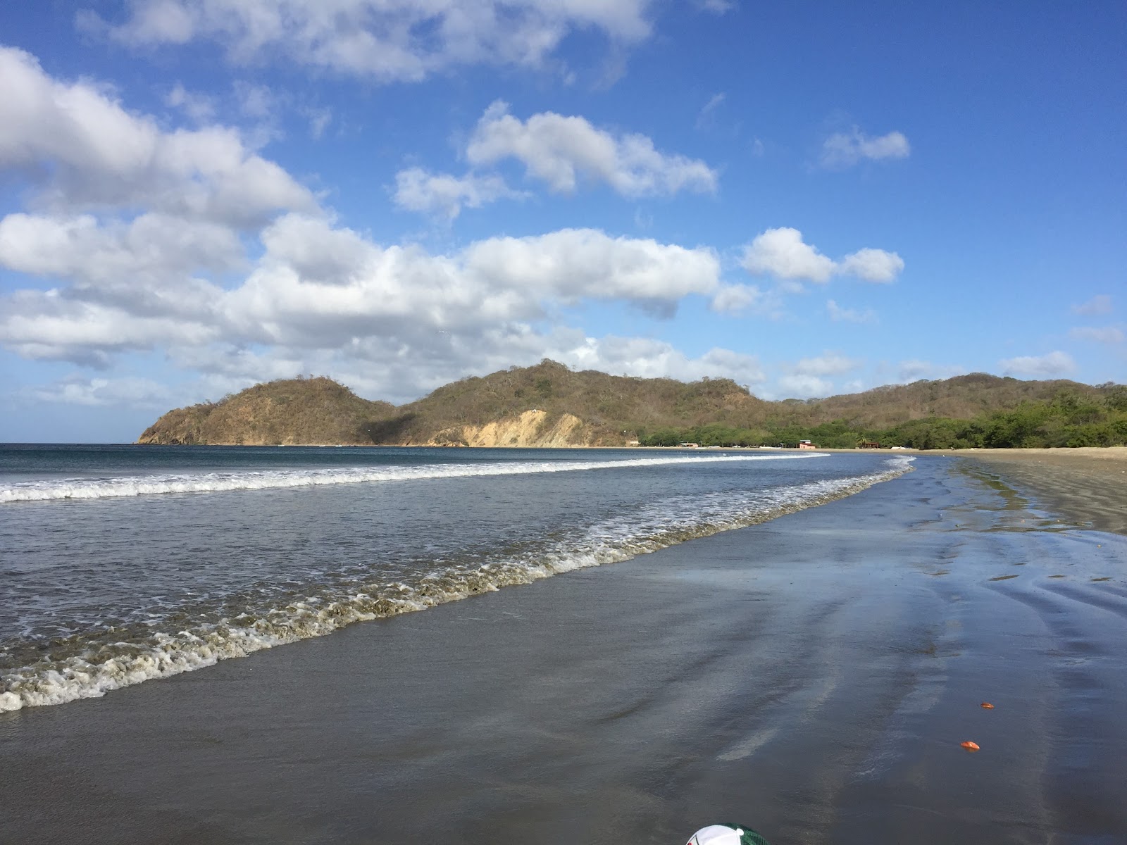 Foto di Spiaggia di Ostional con una superficie del piccoli ciottoli beige