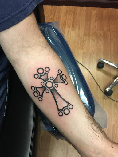 Explore basquiat tattoo ideas, creative tattoo ideas in Farmington, available at TATTOO 13 & Laser Tattoo Removal