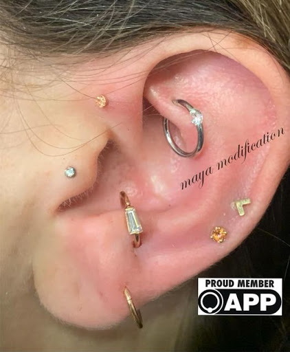 Explore cross tattoo ideas with meaning, creative tattoo ideas in Sioux City, available at Maya Modification