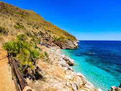 Cala Capreria'in fotoğrafı düz bir kıyı şeridi ile birlikte
