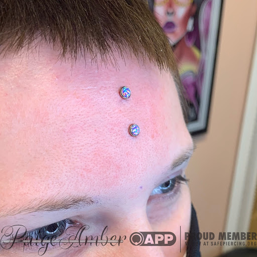 Explore cherub tattoo ideas, creative tattoo ideas in Oshkosh, available at Piercings by Paige at Big Guns Tattoo