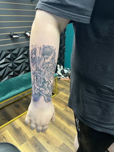 Explore smile tattoo ideas, creative tattoo ideas in Wake Forest, available at Black Heart Tattoo