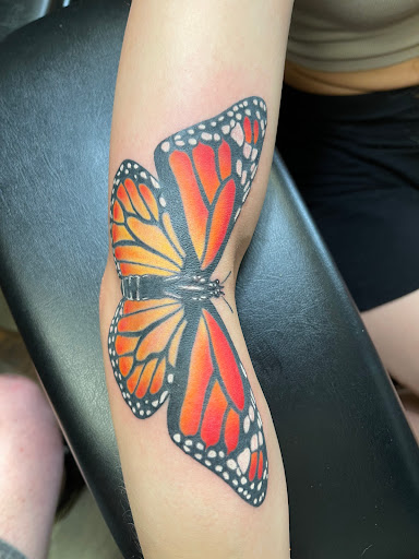 Explore medium tattoo ideas for females, creative tattoo ideas in Seaside, available at Creative Visions Ink Tattoo & Body Piercing Studio - Call for Appointment