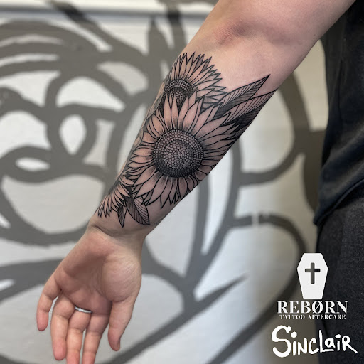 Explore maltese cross tattoo ideas, creative tattoo ideas in Zumbrota, available at Art by Sinclair Tattoo Artist At Dry Bones Ink