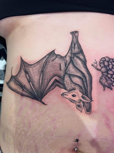 Explore one piece tattoo ideas for guys, creative tattoo ideas in Corning, available at Manifest Studios