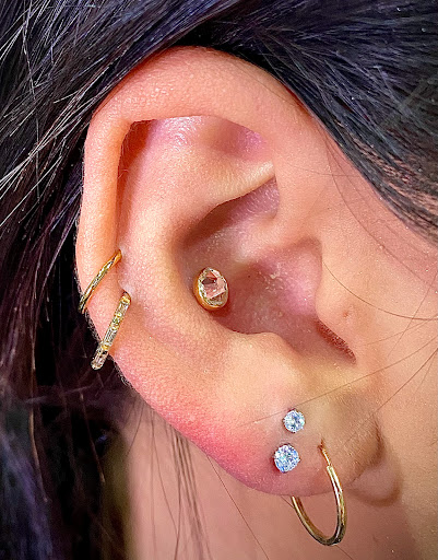 Explore grand teton tattoo ideas, creative tattoo ideas in Orange, available at Symbiosis Body Piercing