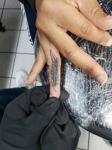Explore behind neck tattoo ideas, creative tattoo ideas in Houston, available at 333 Tattoo Studio HTX