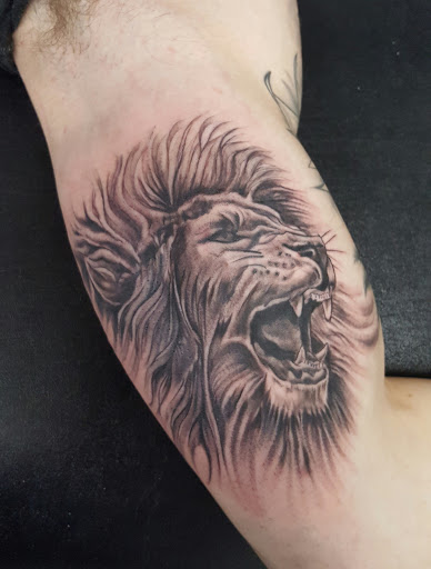 Explore behind the ear tattoo ideas, creative tattoo ideas in Wichita, available at Body Canvas Tattooing