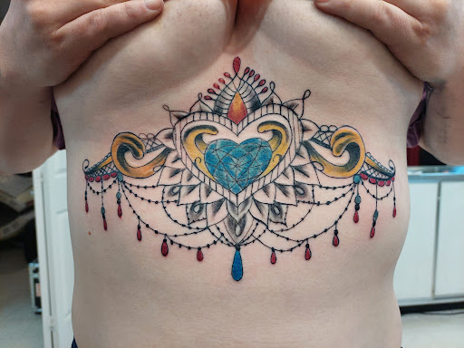 Find cute sloth tattoo ideas for your next unique tattoo in Fort Mohave at RedRum Tattoo & Body Piercing Co.