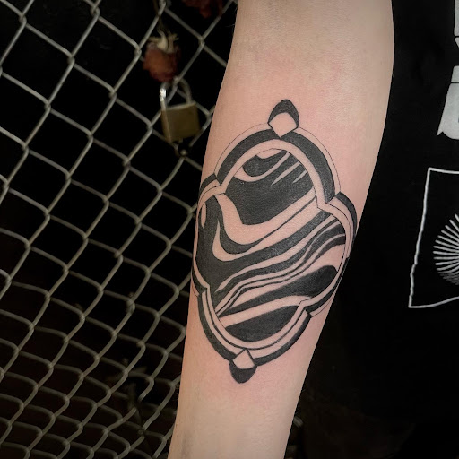 Explore wrist tattoo placement ideas, creative tattoo ideas in Buffalo, available at True Gloom Tattoo Studio