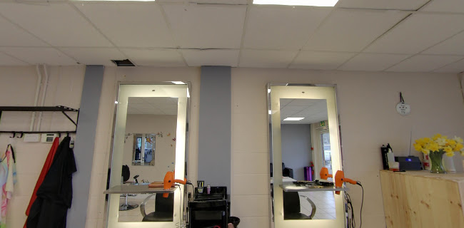 EV Barbershop and Ladies Salon