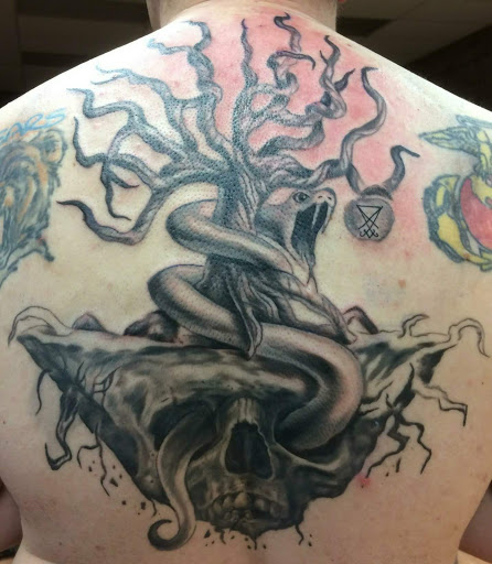 Explore christian chest tattoo ideas, creative tattoo ideas in Seneca, available at Rotation Tattoo