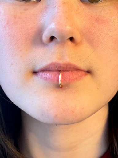 Explore bear paw tattoo ideas, creative tattoo ideas in Bloomington, available at Evil by the Needle Custom Tattoo and Piercing Studio