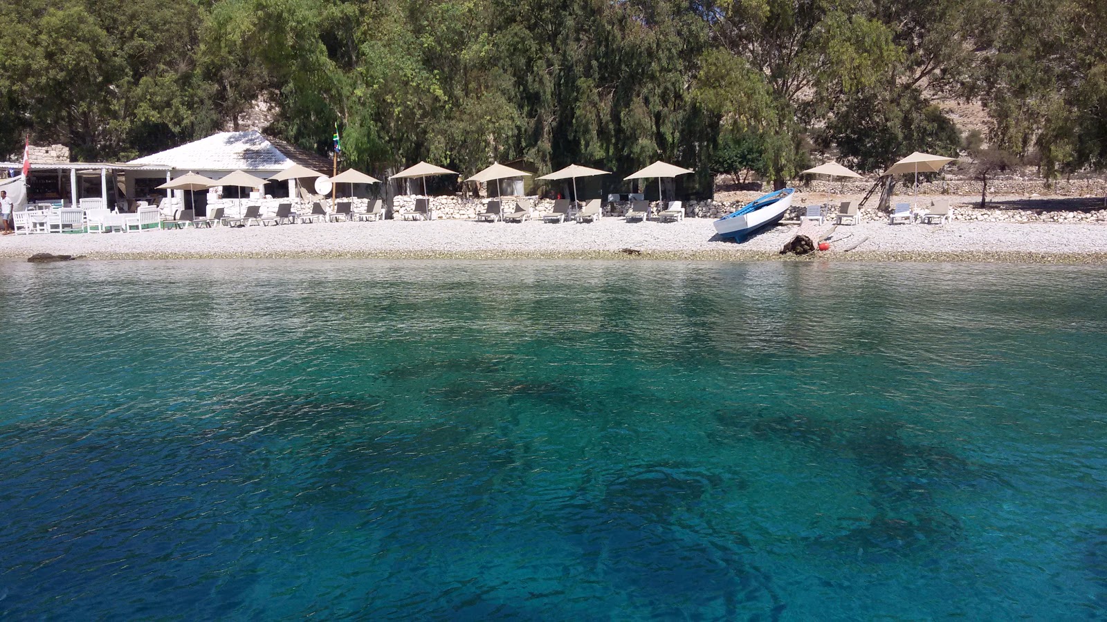Photo of Loryma beach with turquoise pure water surface