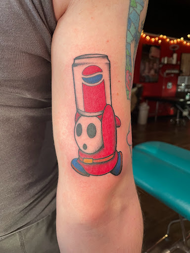 Explore ironworker tattoo ideas, creative tattoo ideas in Lander, available at Blackblood Tattoo and Piercing