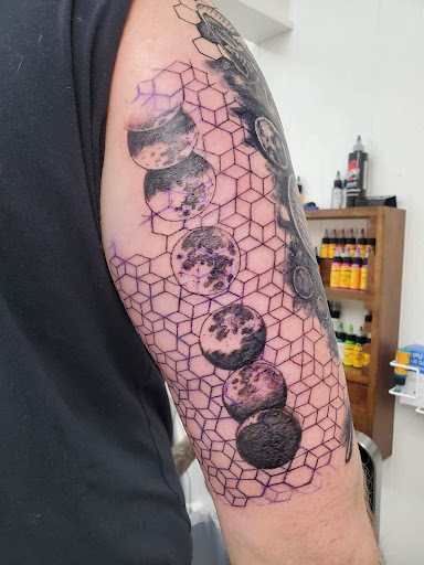 Explore mens knee tattoo ideas, creative tattoo ideas in Salem, available at Outwest Tattoo and body piercing ,30 years of tattooing,only life time guarantee