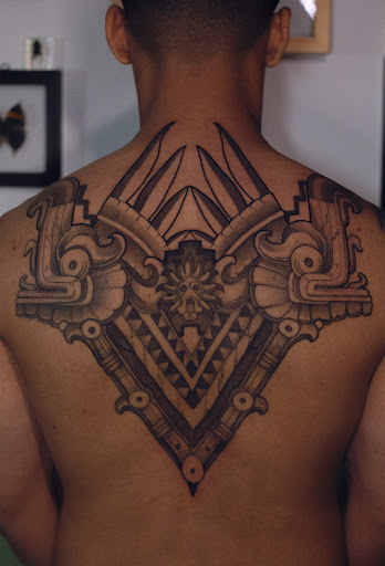 Explore colorful sleeve tattoo ideas, creative tattoo ideas in Hudson, available at The Bohemian Social Club