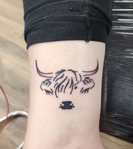 Explore family crest tattoo ideas, creative tattoo ideas in Leavenworth, available at Righteous Tattoo Studio