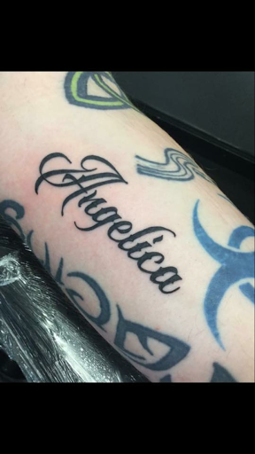 Explore mens back shoulder tattoo ideas, creative tattoo ideas in Hot Springs National Park, available at Spa City Ink