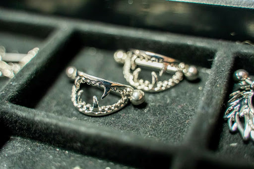 Explore unique semicolon tattoo ideas, creative tattoo ideas in Summerville, available at Exotic Impressions Body Piercing