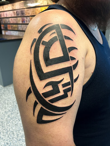 Explore simple black tattoo ideas, creative tattoo ideas in Monroe, available at Skin City Tattoo Studio