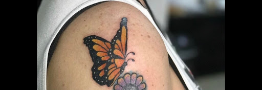 Explore butterfly hand tattoo ideas, creative tattoo ideas in Sarasota, available at Z-Edge Tattoo and Body Piercing North Shop