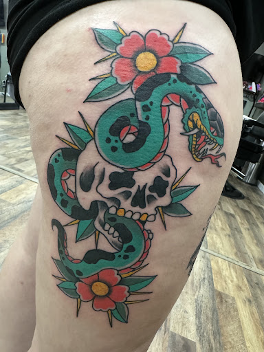 Explore mens hand tattoo ideas, creative tattoo ideas in Vincennes, available at Silver Owl Tattoo