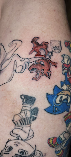Explore thigh tattoo idea, creative tattoo ideas in Sulphur Springs, available at Legacy 13 Tattoo Studio