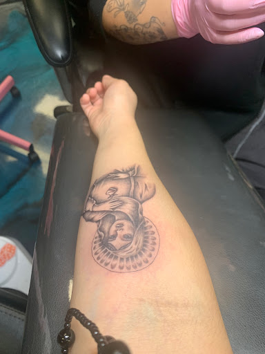 Explore military dog tag tattoo ideas, creative tattoo ideas in Whittier, available at Whittier Tattoo