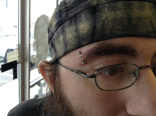 Explore biking tattoo ideas, creative tattoo ideas in Seymour, available at American Gypsy Tattoo Corp.