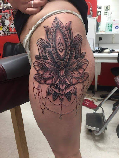 Explore mental health ribbon tattoo ideas, creative tattoo ideas in New Braunfels, available at To The Moon Tattoo Studio