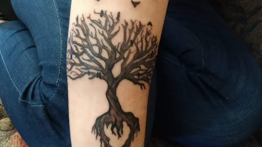 Explore lower back cover up tattoo ideas, creative tattoo ideas in Wadena, available at Bryniarski tattoo